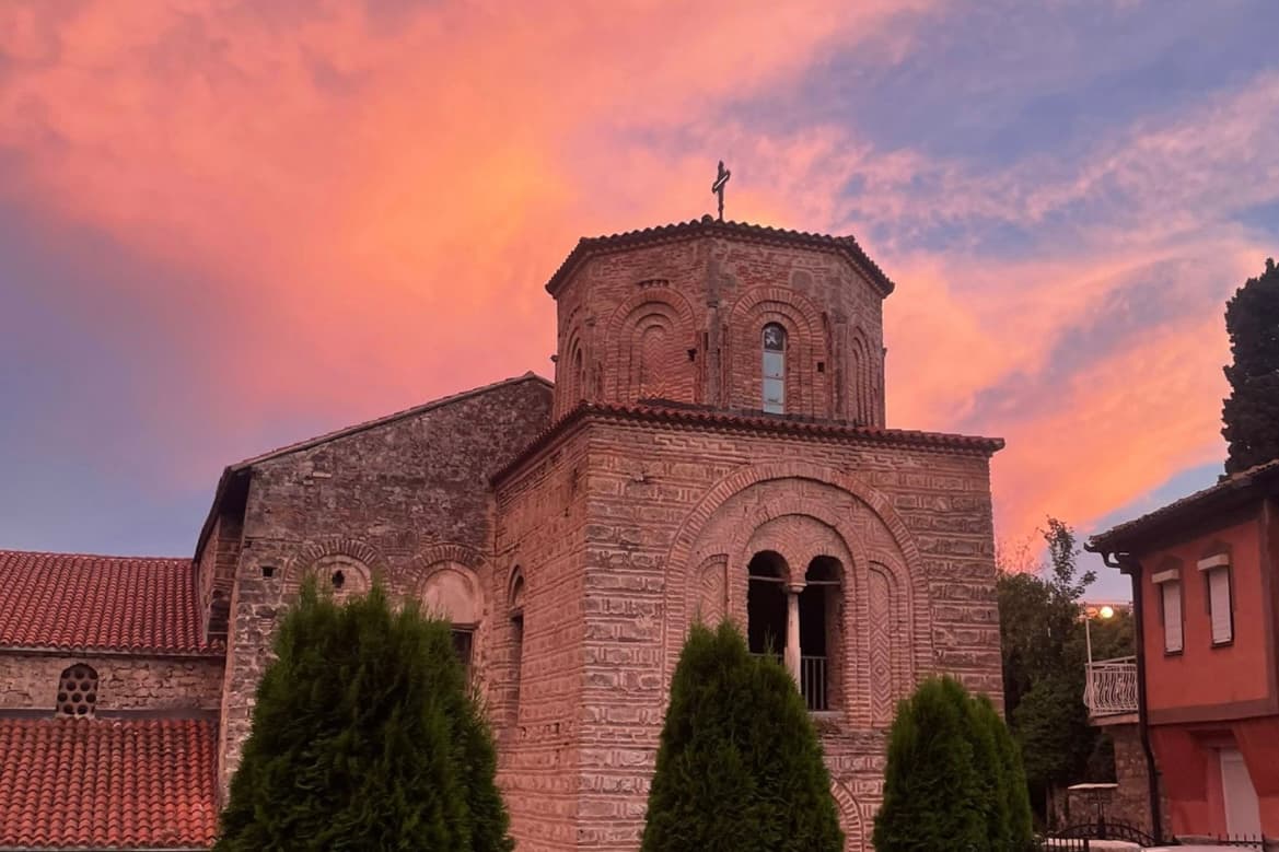 Church of Holy Mary Peryvleptos beneath a vivid sunset